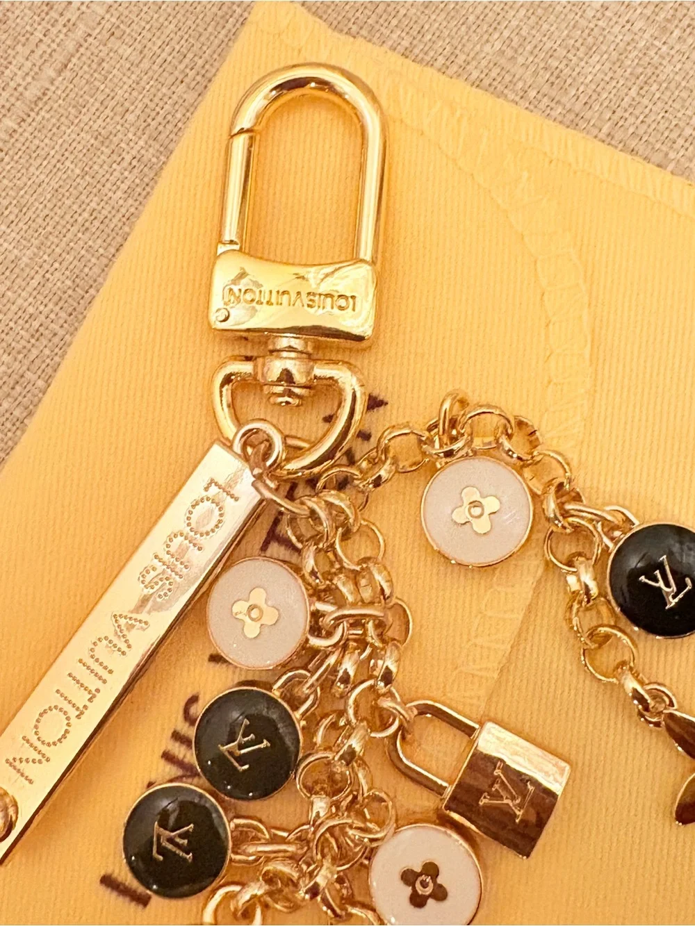 Louis Vuitton Gold Charm Key & Card Holder with Black and White Enamel Accents